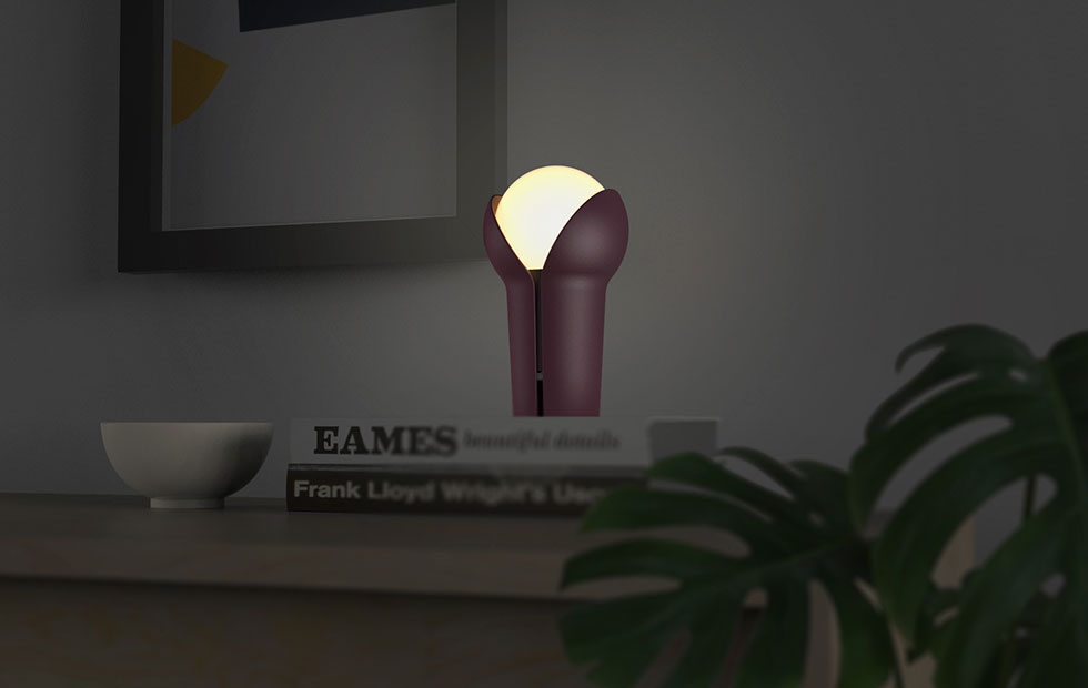 portable bud lamp in aubergine turned on at night