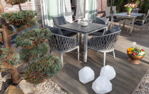 asteroid plastic outdoor lamps beside outdoor seating area